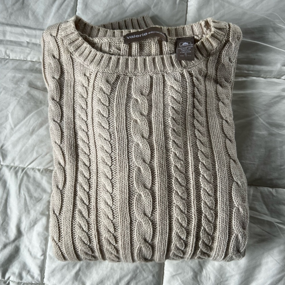 Valerie seperate a cable knit sweater